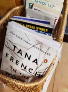 Books in a basket Why Writers Should Read